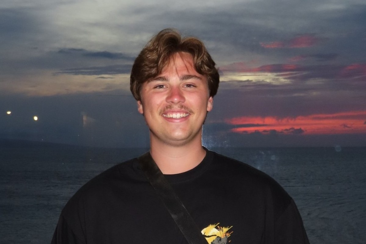 Ashton Pleickhardt at dusk by the ocean